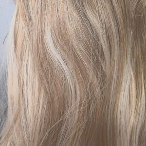 Tape in human hair extensions